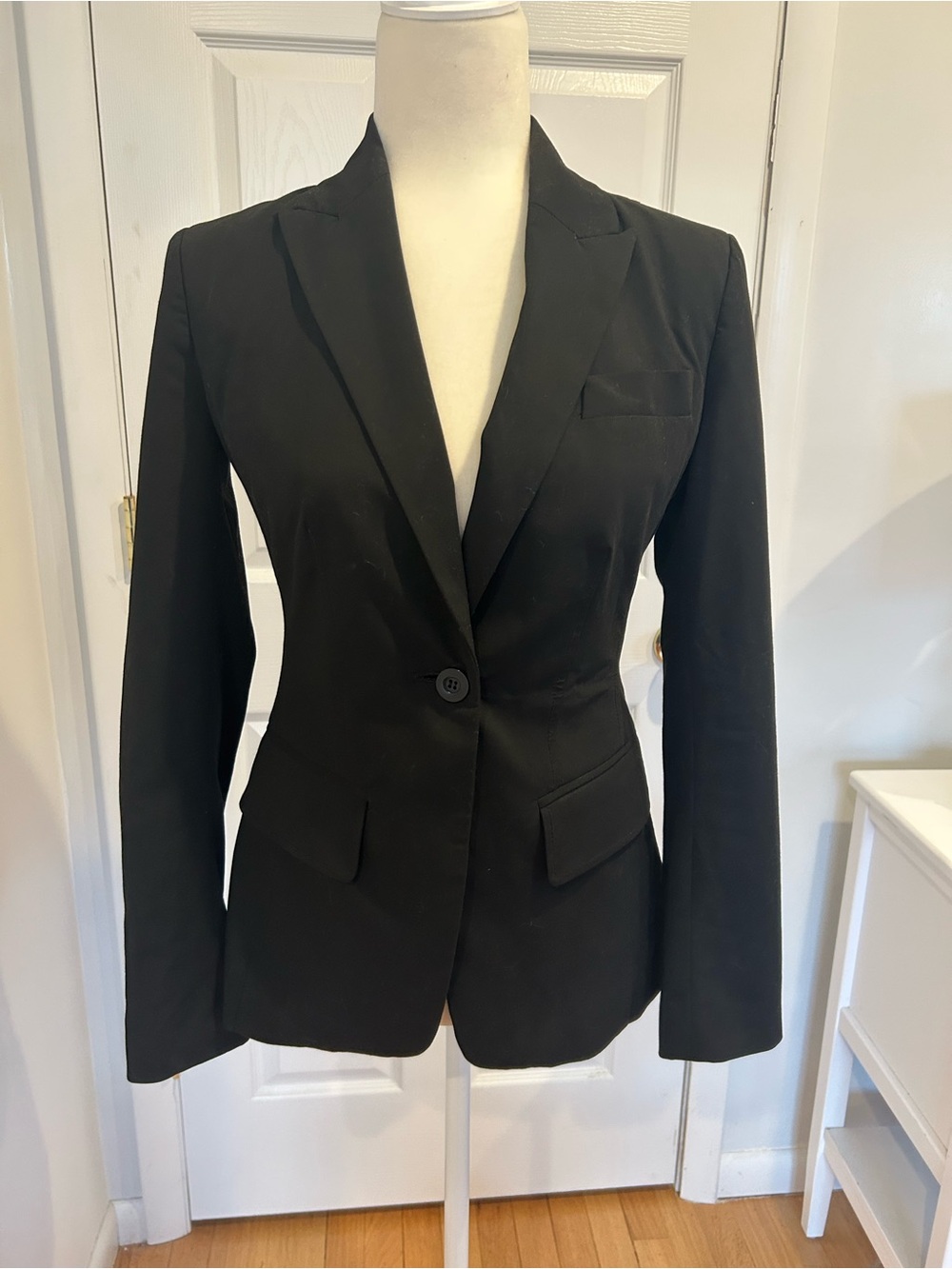 bebe Black Single-Button Tailored Blazer with snake skin satiny lining.